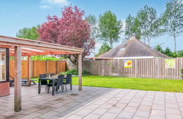 This vacation home in Zeeland is in a beautiful location near the water.