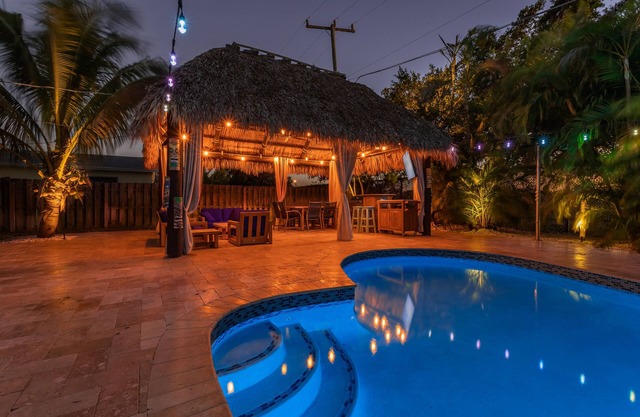 Tiki Paradise OasisnHome + Pool, Tiki Hut & 10 Min to Beach!