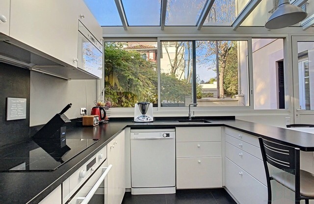 Town house with kitchen veranda and terrace