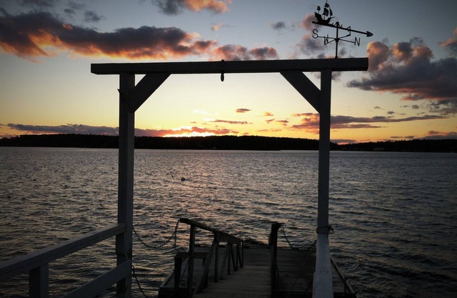 Tranquil! Oceanfront Sunsets with beach at low tide and dock