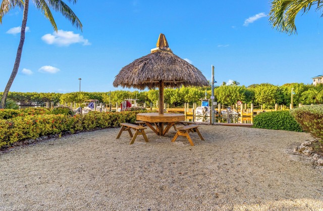 Tropical Bliss! Private Beach, Pool Access & Near Dolphin Encounters!