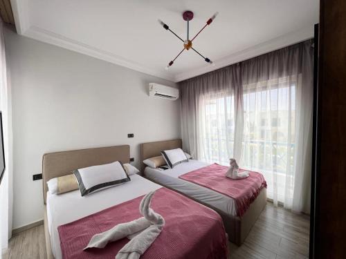 Twin house 4 master Bedrooms premium mountain view Ras Elhikma