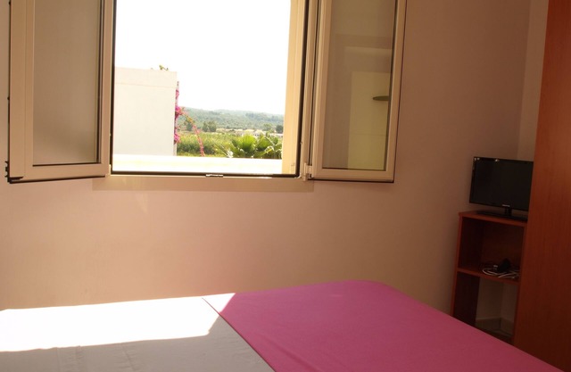 Two-room attic apartment with a view only 100 meters from Torre Mozza beach