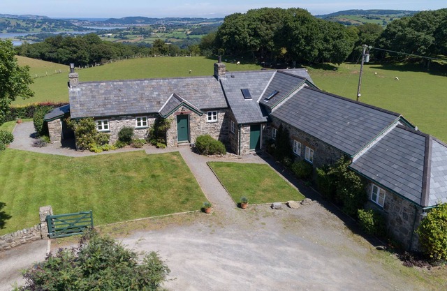 Ty Newydd is a period farmhouse on the Bodnant Estate