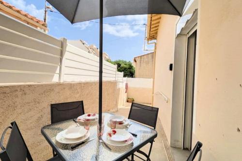 Typical house 20 m from the beach and the port