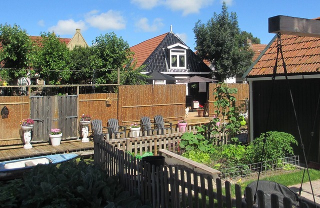 Unique holiday apartment with its own pretty terrace on the water.
