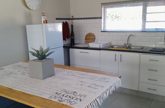 Unit Elaine, a cozy 1-bedroom apartment in serene Cape Town with free WiFi.