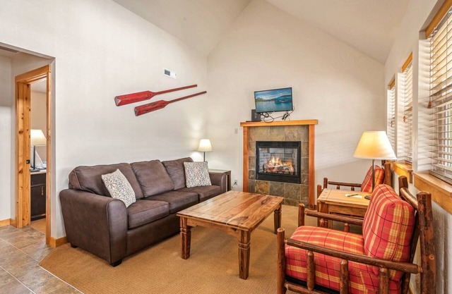 Unwind at Fish Tales Bungalow, a charming coastal-style hideaway just steps from the lake. Enjoy resort amenities, trails, and the tranquil Dover Bay setting.