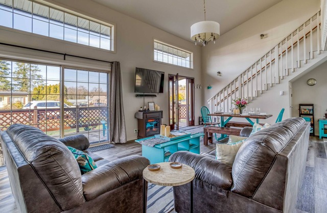 Updated Bay City Home Has Sunny Great Room, Fenced Yard, Deck, and Game Room!