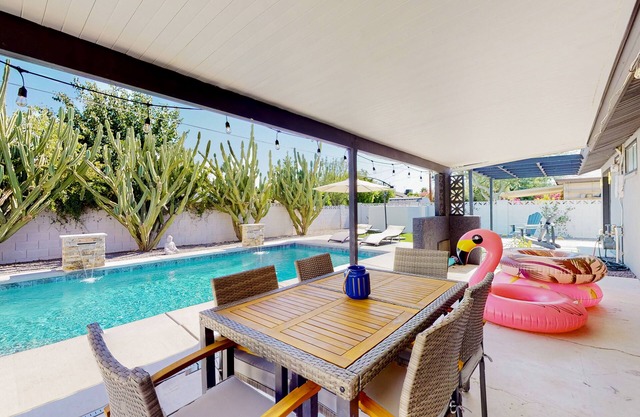 Updated, dog-friendly home with private pool, patio & great location