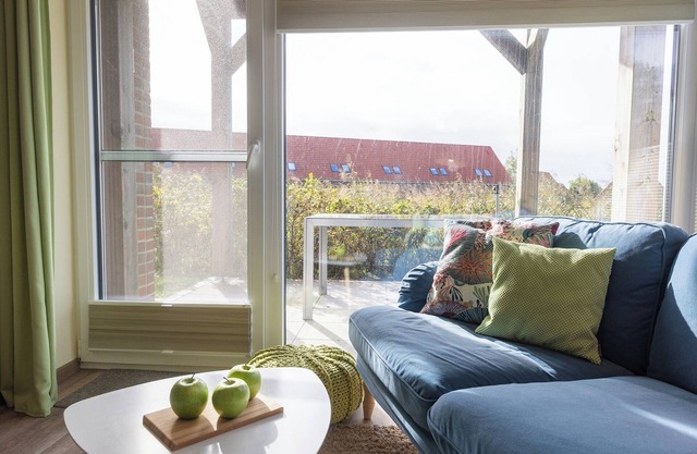 Vacation apartment Wremer Bogen 9-1-1 directly on the mudflats and with terrace.