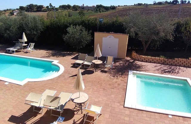 Vacation home of 7 apartments garden, swimming pools common lounge.Suitable for groups