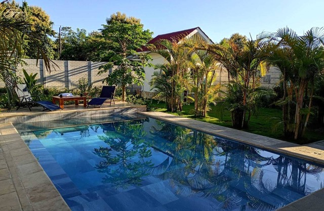 Villa Feliz: Rustic charm meets modern luxury in a 3BR villa with private pool.