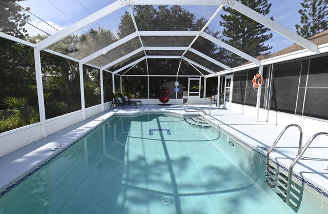 Villa Style Living w/Sunroom, Heated Pool & WiFi