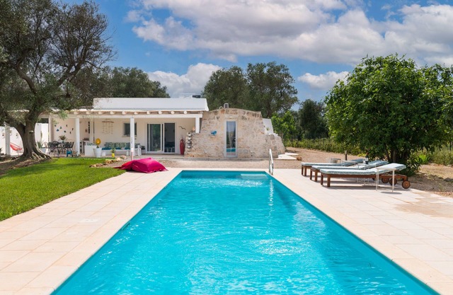 VILLA WITH TRULLO AND POOL SURROUNDED BY OLIVE GROVES