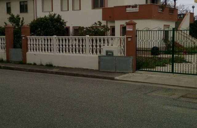 Villa with garden divided into apartments