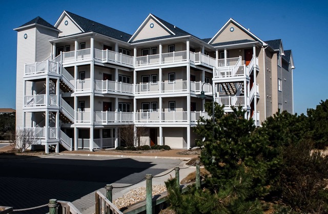 Waterfront condo with private washer/dryer, pool, water views, and free WiFi