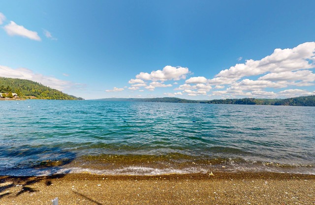 Waterfront, dog-friendly home with amazing scenery, private beach & decks