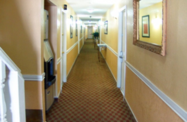 Welcome to the Holland inn suites room with King Bed.