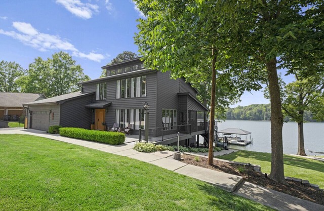 Whiskey Sunsets: Stunning Peninsula Retreat with Panoramic Lake Views, Dock, Hot Tub, and More!