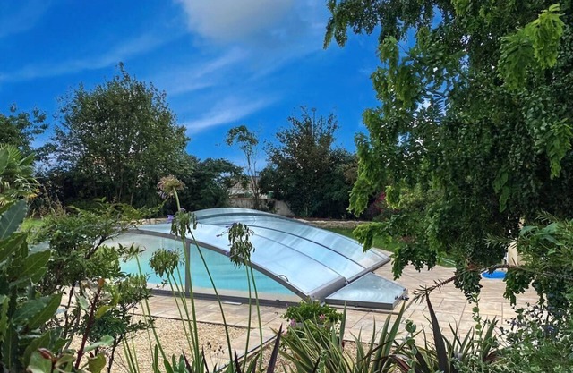 With its private swimming pool heated and secured by a dome, family villa