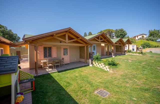 Wooden house with porch and garden