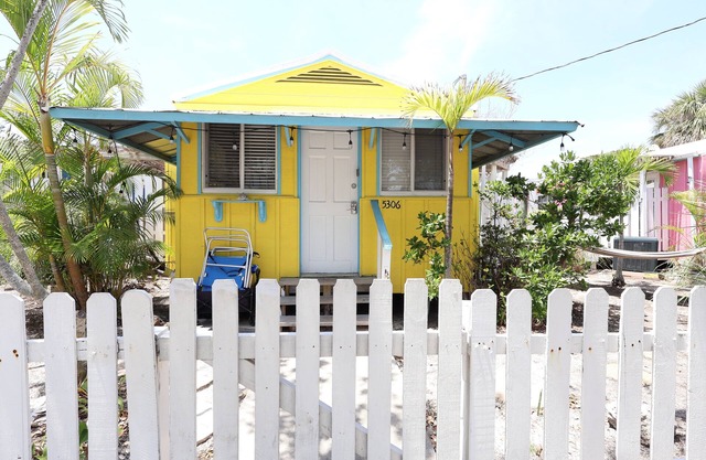 Yellow Palm Cottage steps from the beach