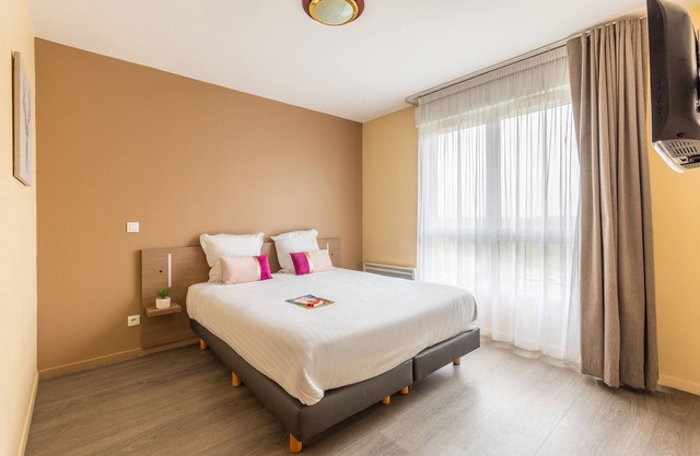 Zenitude Hôtel - Résidences Magny les Hameaux