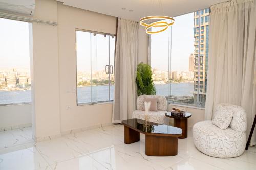 Oula Apartment | شقة فندقية اطلالة عالنيل بالكامل في قلب القاهرة بجوار الفورسيزون