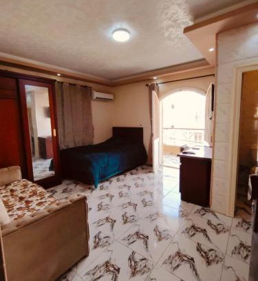 6th of October City House | غرف و استديوهات منفصلة مفروش غرفة ماستر بحمام ومطبخ صغير لا يتشارك مع الغير اي شيء بنات فقط أو عوائل