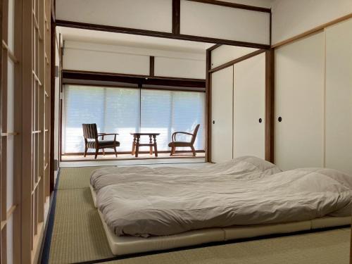 Yamanouchi Apartment | 和宿520ゴーニマル緑青