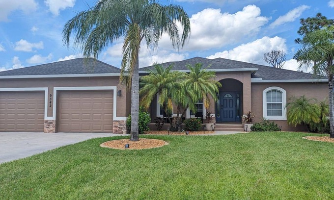 Englewood East House | 10 Minutes to Beach Bliss, with Heated Privet Poolside Haven!