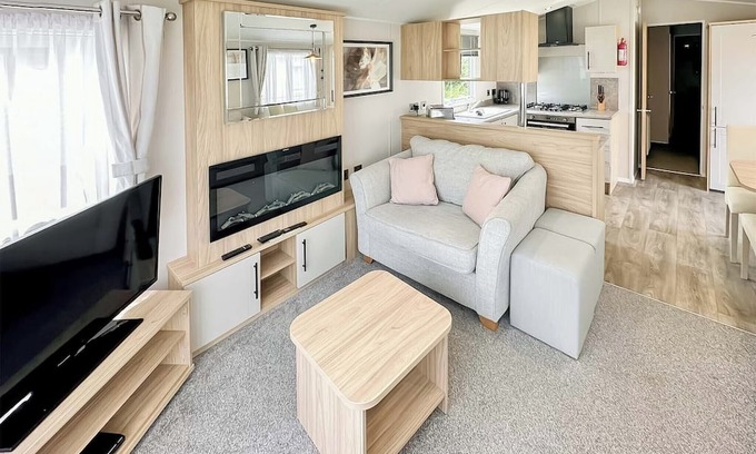 Cross Inn House | 12ft-wide luxury caravan with one double with en suite shower and one twin.