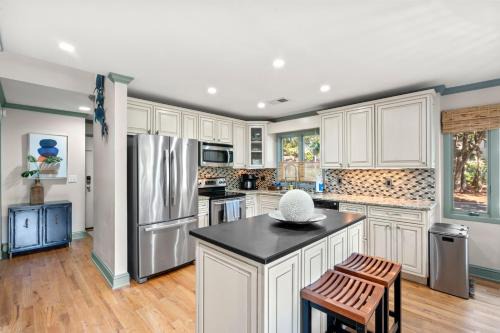 West Beach Village Villa | 1337 Fairway Oaks Villa by Akers Ellis Rentals