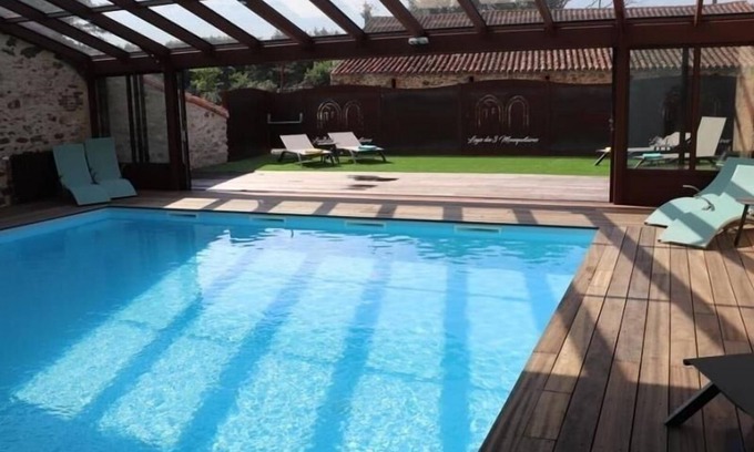 Les Herbiers Cottage | 18th Century Cottage with Covered Pool, Terrace, and Game Room - 6 People