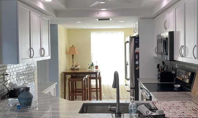 Bonita Springs Condo | 1st Floor Condo with community pool & 1 dedicated carport space
