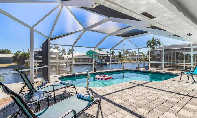 Saint James City House | 2/2 Pool Home on the Water, Boat Lift Included!