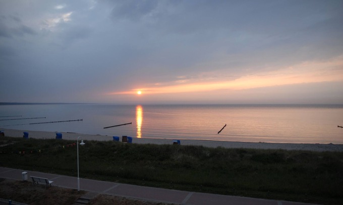 Glowe Apartment | 2 balconies directly by the sea, living room, fireplace, 1 bedroom, kitchen, modern bathroom with shower/WC, washing machine.