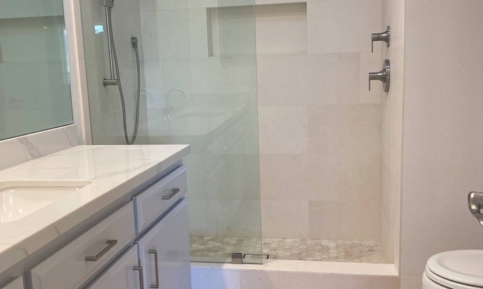 East Beach Condo | 2 bed spacious condo steps from beach + pool!