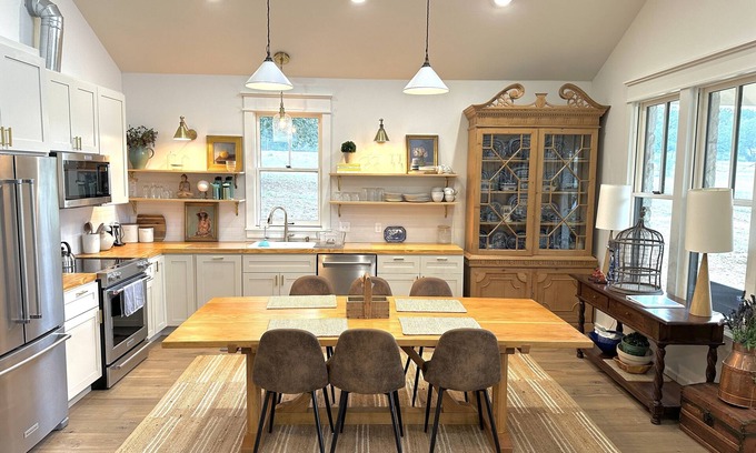 Johnson City House | 2 bedroom/2 bath stone farmhouse overlooking hill country creek on 50 acres