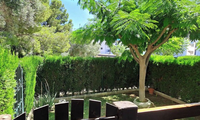 Peniscola Apartment | 2-bedroom apartment with AC, private garden, next to calas and natural park