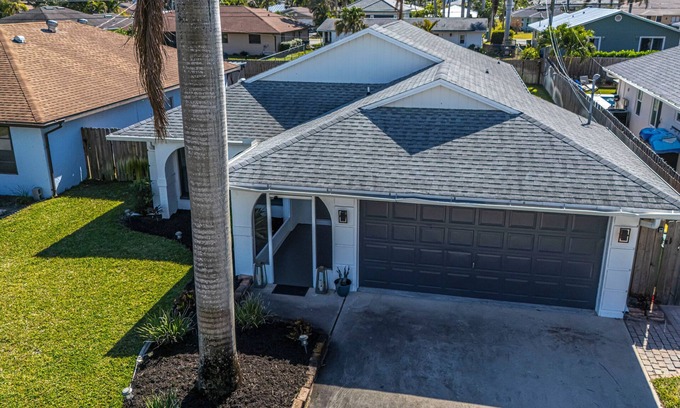 Naples Park House | 2 Pool homes located right next door to each other 7 total bedroom 4 total baths