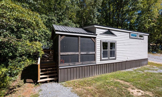 Mill Spring House | 2-story tiny home nestled on the creek, quick walk to pool and playground, private firepit, sleeps 7.