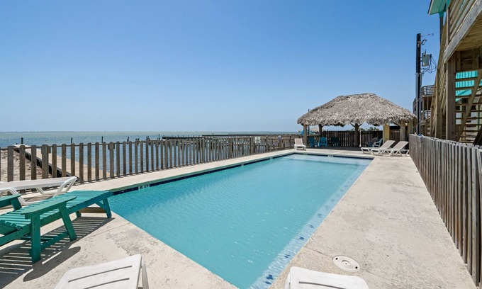 Flour Bluff House | 2 Waterfront Homes w/Views, Pool, Boat Dock | Laguna Village Oasis by AvantStay