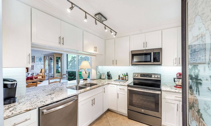 Imperial Golf Estates Condo | 2B/2B FABULOUS WATERFRONT NAPLES CONDO! ABBEY ON THE LAKE