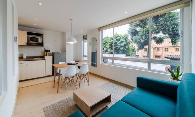 Financial District Apartment | 2BRR Cozy Apartment in Zona G with Laundry Facilities + Wifi