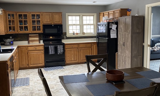 Oshkosh House | 3 bedroom/2 bath home; close to EAA. Large kitchen and outside deck area.