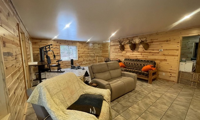 Newaygo House | 3 minutes from the Muskegon River! Quiet and spacious home with a large deck.