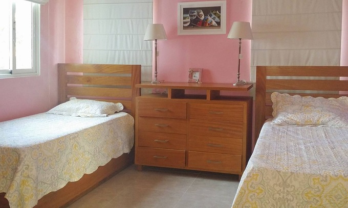 La Esplanada Apartment | 3BD central condo in Sosua, fully equipped, large pool, WIFI BBQ A/C Cable TV
