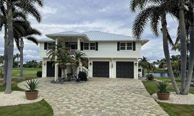 Alden Pines House | 3BR Coastal retreat in peaceful Bokeelia with pool, bikes, ping pong and fishing